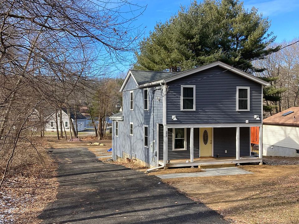 Front of house with Hamilton Reservoir in background