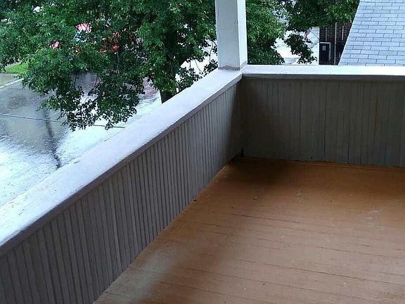 covered porch on 2nd fl with overhead covered light