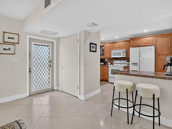 3rd image of 2460 DEER CREEK COUNTRY CLUB Boulevard #206-A