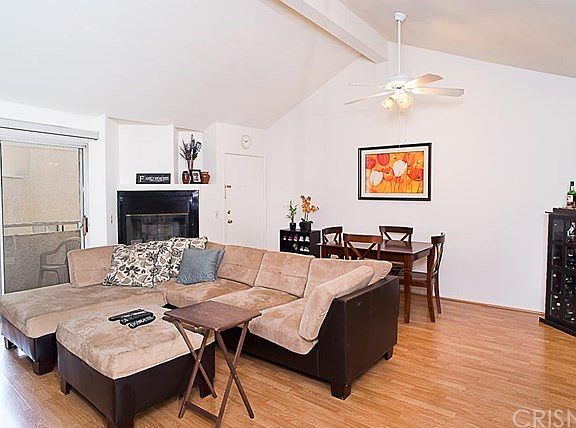 Living Room with high ceilings and fireplace.