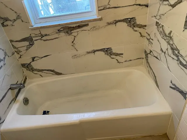 Bathroom: new ceiling height wall tiles