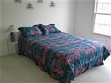 Master Bedroom with Master Bathroom. Beautiful View of Golf Course.