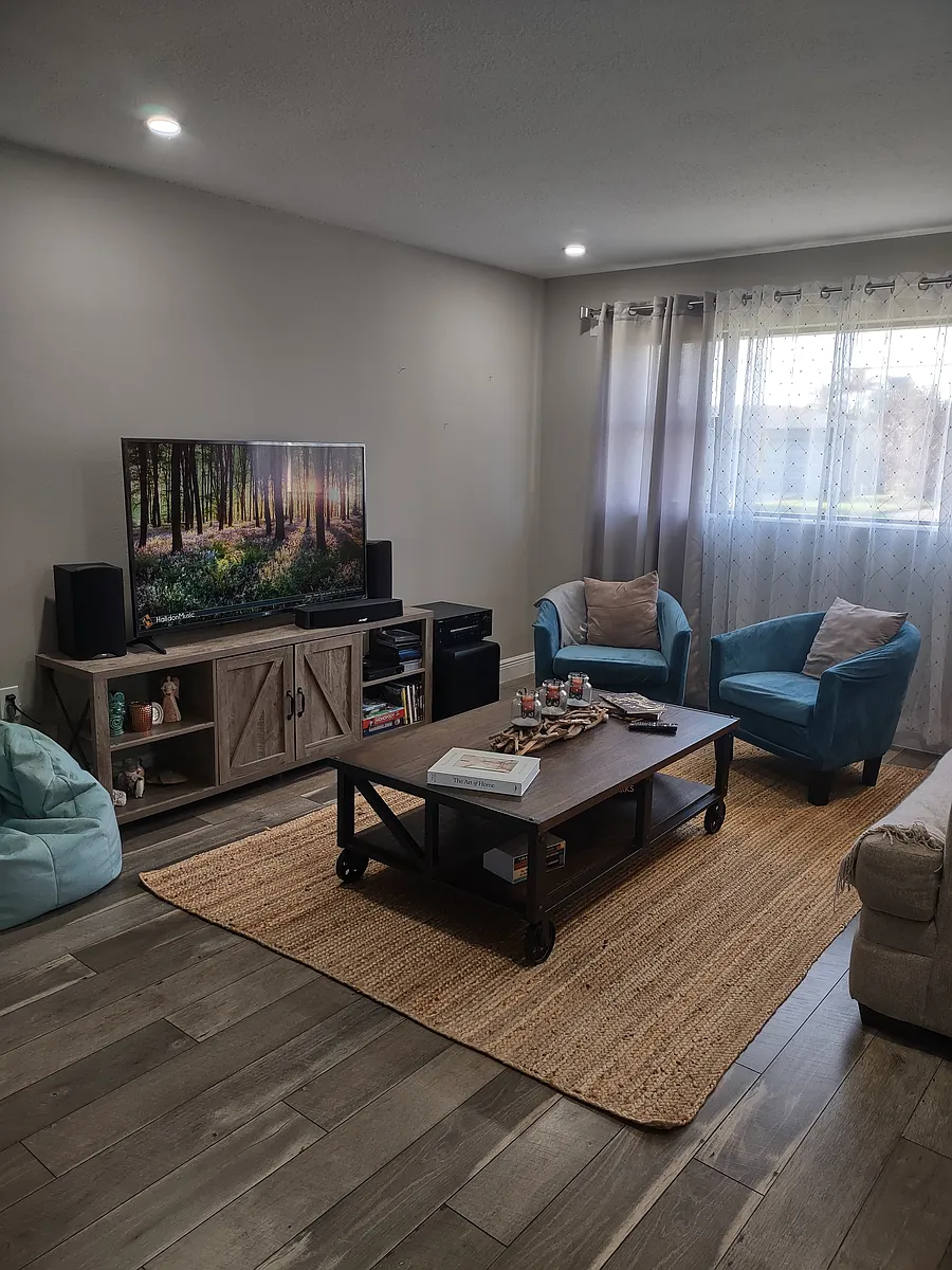 Living Room w lots of natural light - Plum Ave