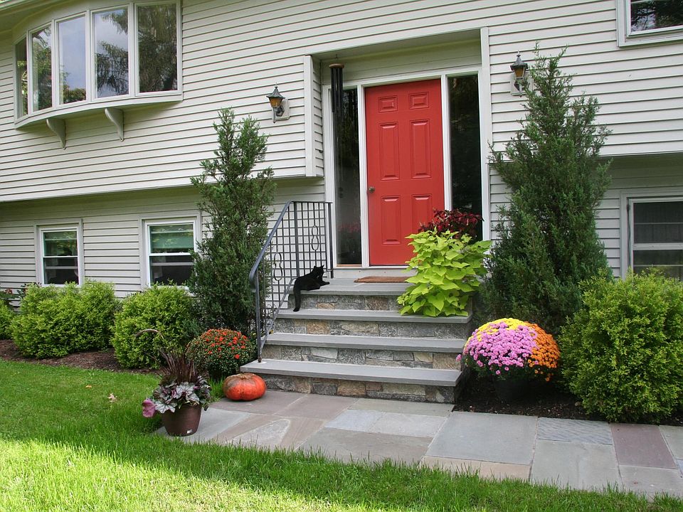Front door with the current color. Access to the smoke and pet-free apartment is through the garage or bedroom deck slider.