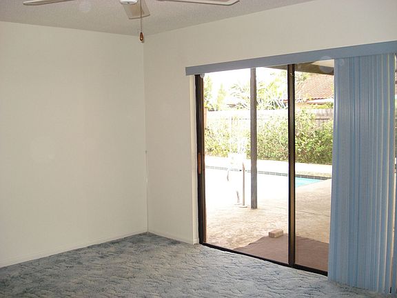 Master Bedroom w/sliders to pool