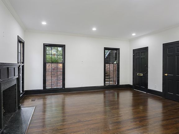 Living Room _ Gas Log Fireplace, Coat Closet, Large Windows Give Plenty of Natural Light