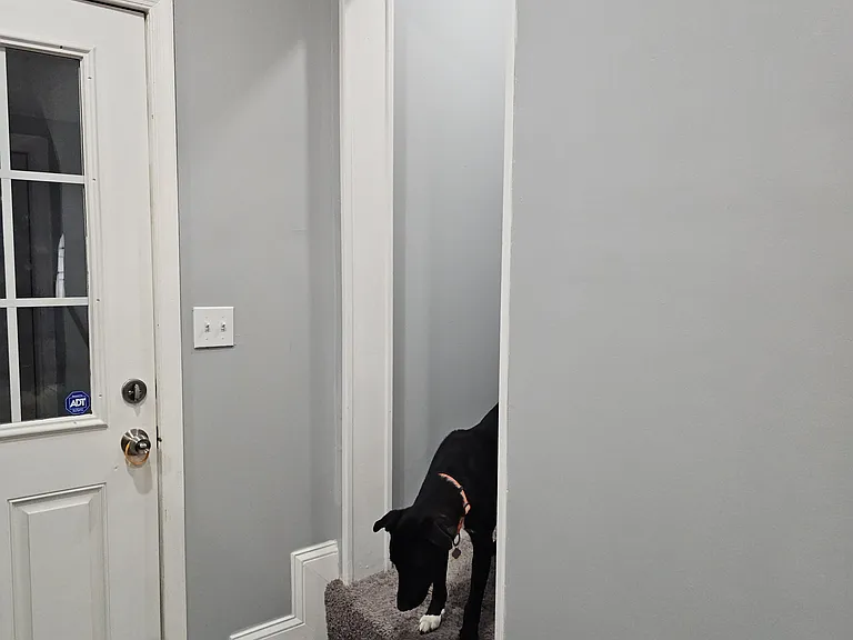 Entrance to second floor from kitchen.