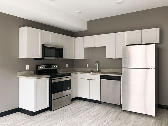 Spacious Kitchen Complete With Stainless Steel Appliances