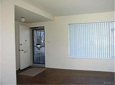 Living room looking to front door.