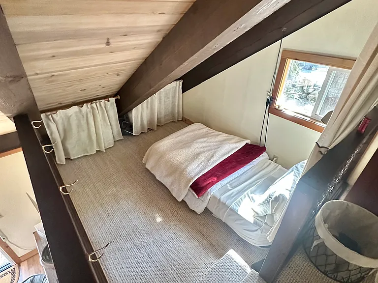 Loft with blow up mattress. Can fit one queen or two twins.