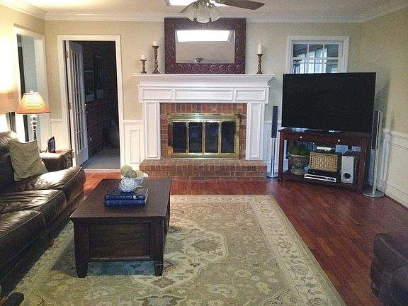 Den with gas burning firepla