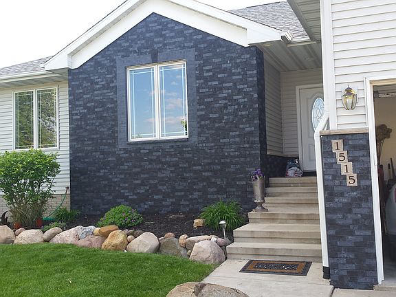 view of landscaping/entry