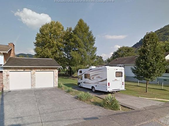 Plenty of parking space.  This is just one side of the home.  Another garage and driveway also on the other side.