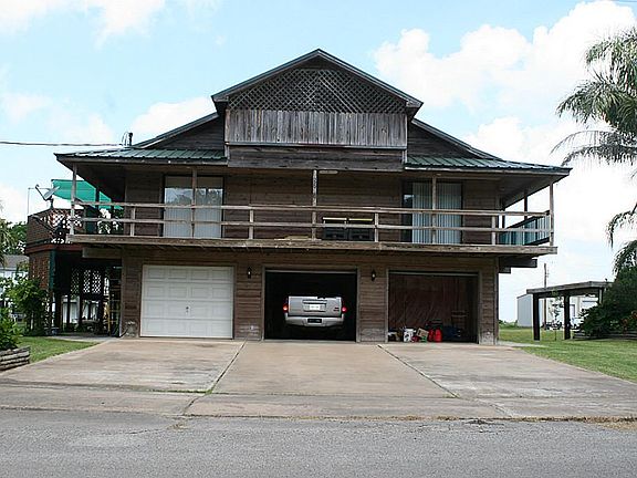 Back of the Home as You Drive up. Walk Around Deck around 2nd Level