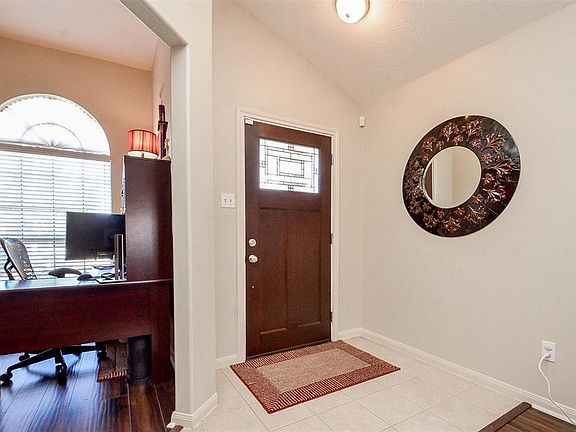 Wide doorways are welcoming and beautifully convenient in this area, along with elegant high ceilings.