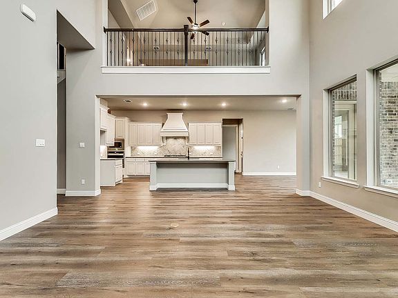 Bingham floor plan by Pacesetter Homes featuring a spacious two-story layout with a first-floor prim