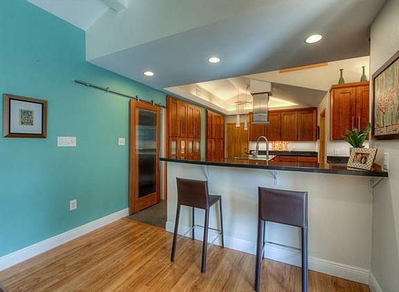 Fluted glass sliding door just beyond the breakfast bar