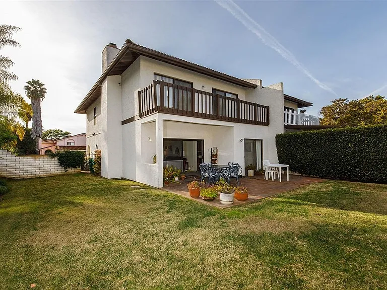 Backside of house and balcony view.