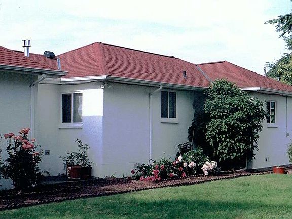 Back yard with gates separating front from back yard.
