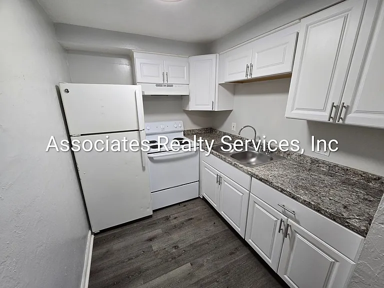 7001 SW 6th Pl #A-H — Photo 1