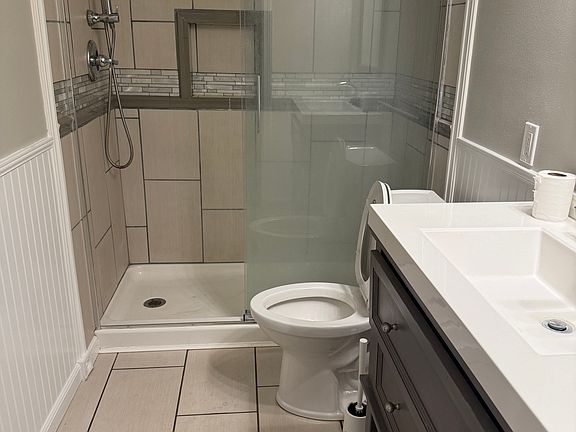 master bathroom with walk in closet