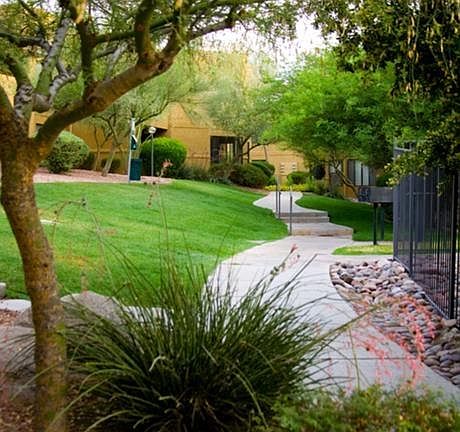 Beautifully landscaped with wandering paths through out the community ~