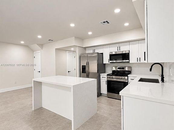 4th image of 7164 W 3rd Ave