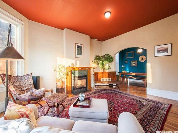 Living room with previous decor (currently painted white)