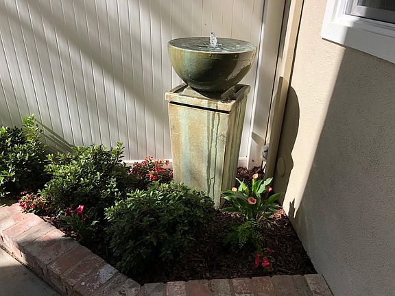 Fountain can be heard in Kitchen, Family Room and Master BA