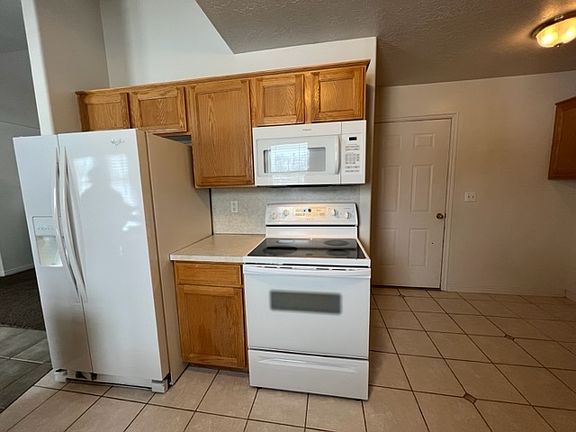 Kitchen and door to garage