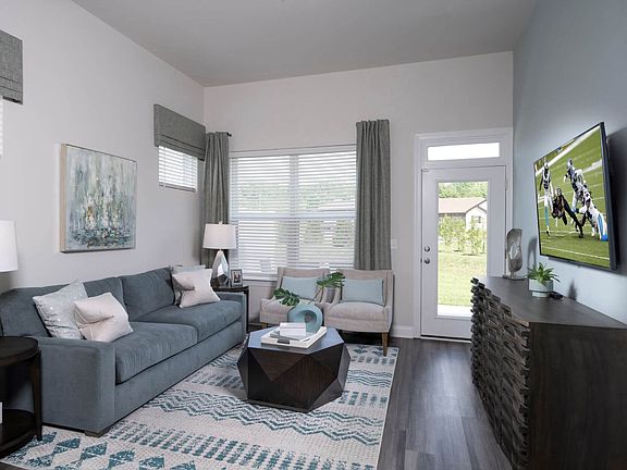 The great room offers easy access to the back patio.