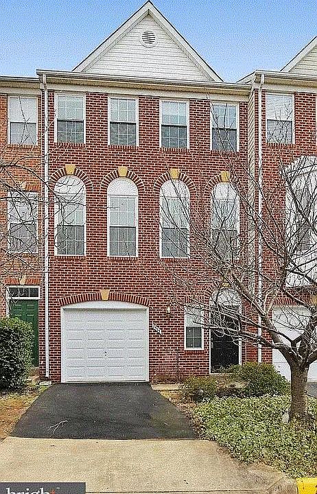 Front view, driveway, garage