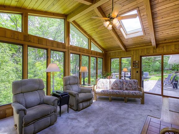 Another view of the porch.  New skylights with retractable shades.  Vaulted ceiling.  LOTS of windows !