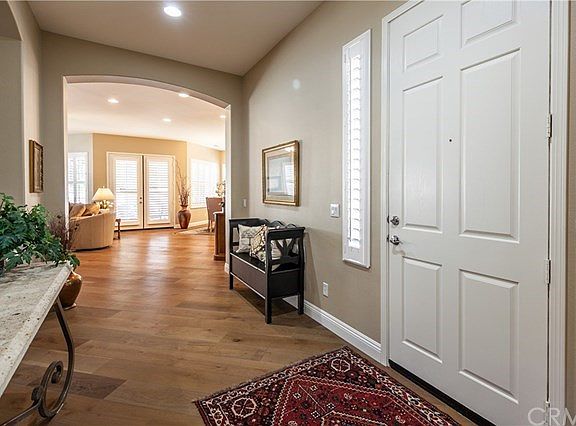 Entry leads to Great Room and the Double-Doors lead to Back Yard.