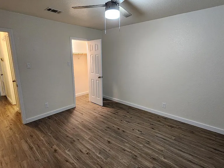 Lighted closet in back bedroom.