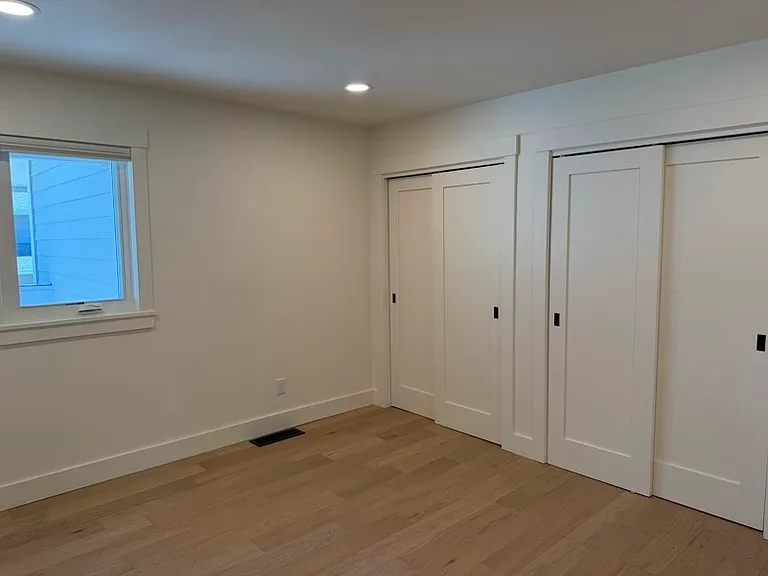 Bedroom 1 double closets