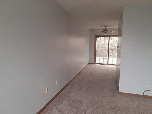 View of the dining room and deck from the living room