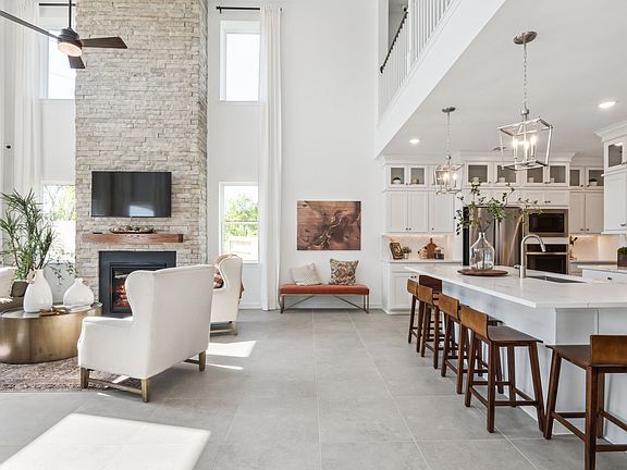 Open floorplan with airy two-story ceiling