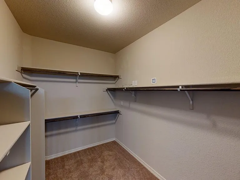 Large Primary Walk-In Closet