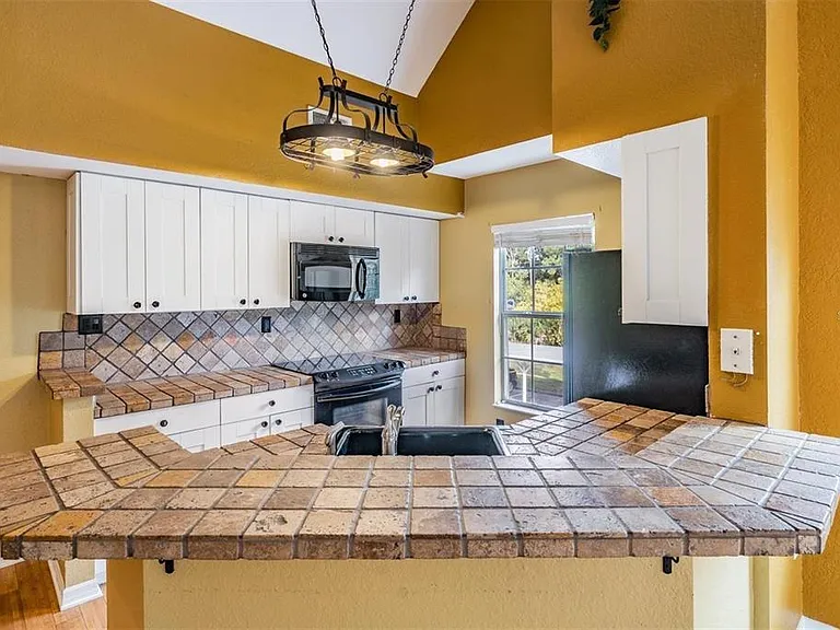 9156 Lake Chase Island Way #9156 — Photo 22