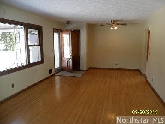 wood floors and tile throughout, only carpet is on stairway, and lower storage room off of laundry room