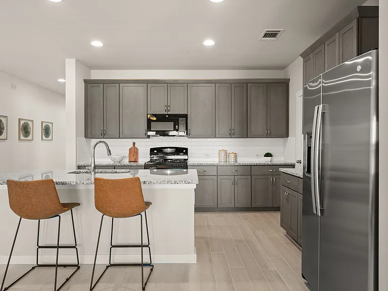 New (2024) kitchen appliances are included - frig, gas stove, dishwasher and microwave.