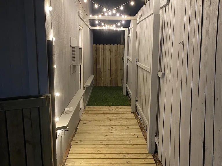 Private entrance with tiny yard.
