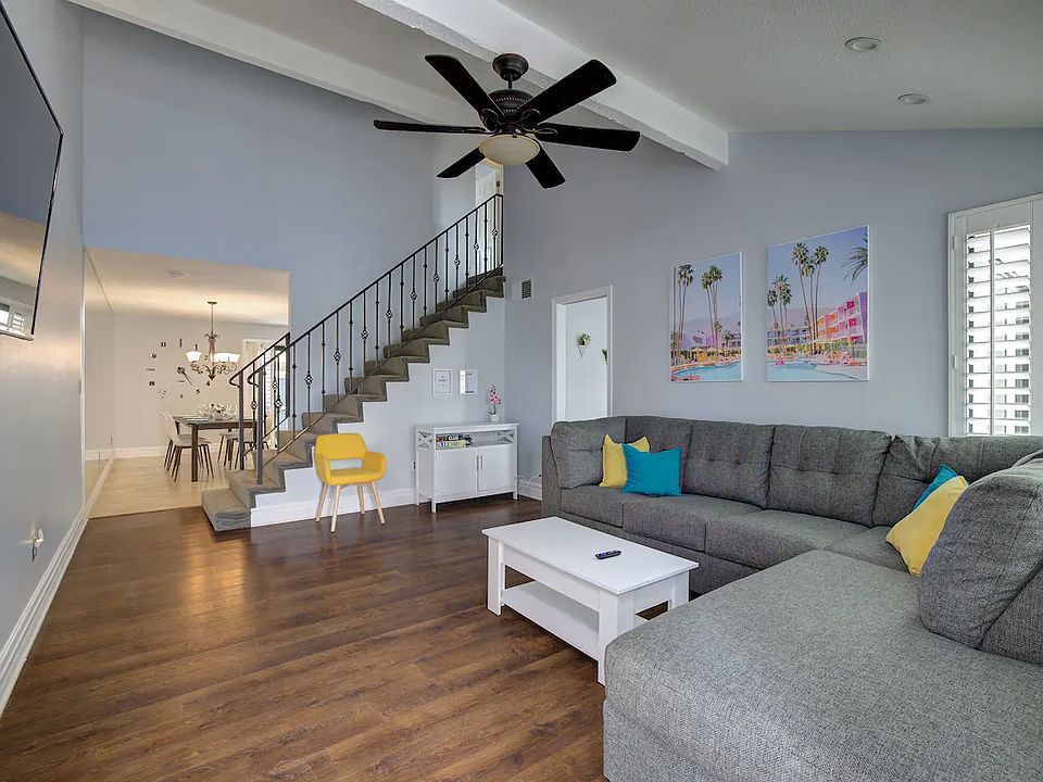 Living Room with 55" Roku TV. Coffee table lifts into work space.
