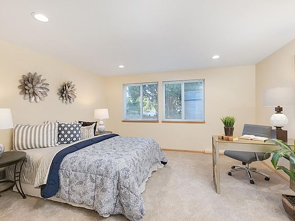 Huge main floor bedroom would make an excellent home office. New carpet