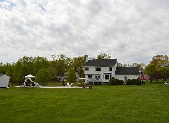 Still inside the fully fenced backyard.