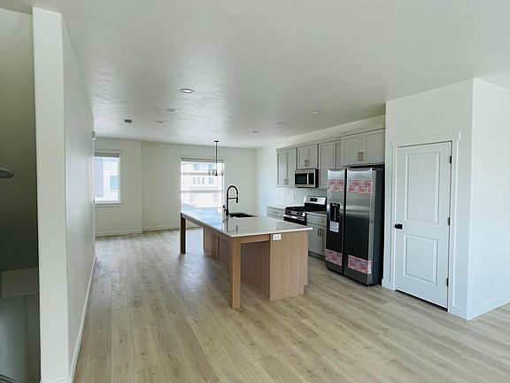 Huge white oak island that easily seats 6 people.