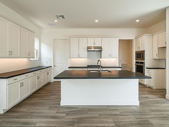 Beautiful Upgraded Kitchen with Large Center Island and Walk-In Pantry