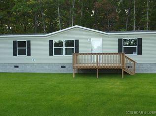 10 Painted Tree Ln, Rocky Mount, MO 65072