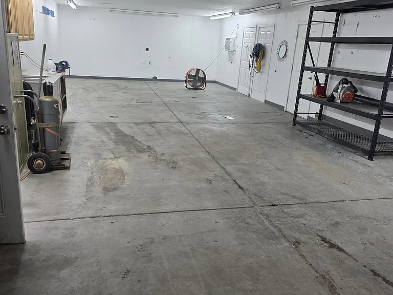 Six car garage with new concrete, two wide and three deep